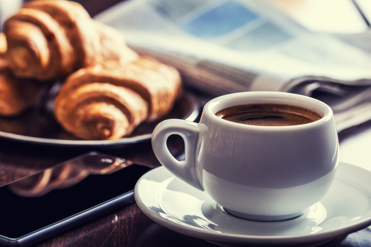 coffee on a table with croissants